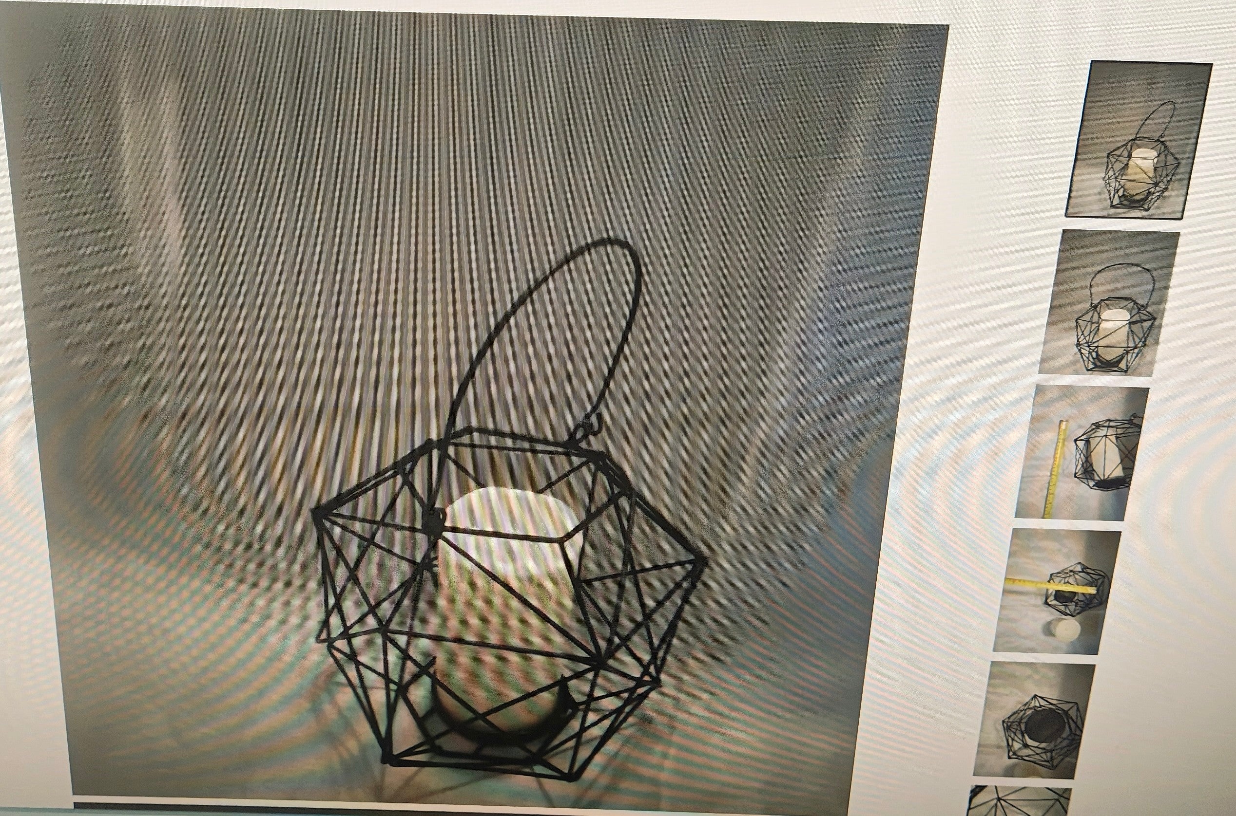 Thin black metal candle holder with battery operated cream candle