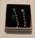 Genuine Pandora sparkling eight stones drop earrings. Sterling silver.